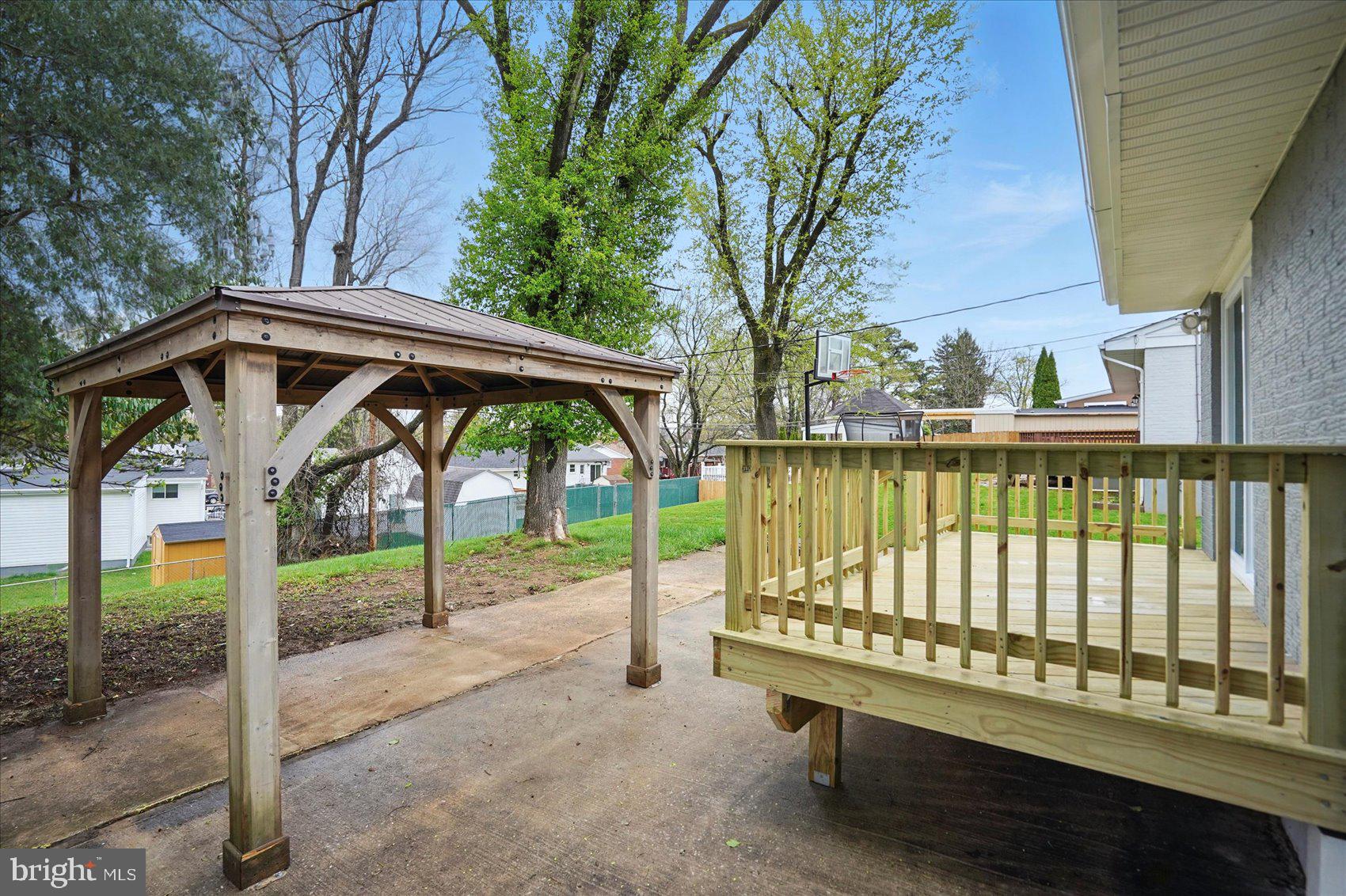 3816 Cherrybrook Road Randallstown, MD 21133 - Photo 35 of 35 a view of a patio with a table chairs and a table