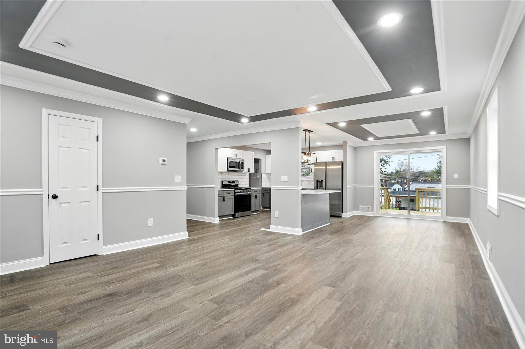 3816 Cherrybrook Road Randallstown, MD 21133 - Photo 5 of 35 a view of a kitchen with wooden floor