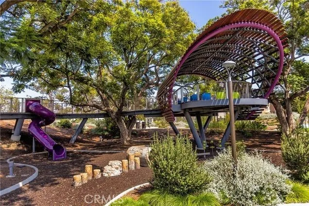 a view of swimming pool with sitting area