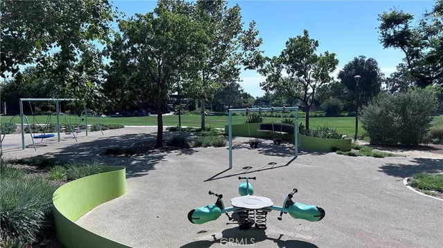 a view of a backyard with sitting area and furniture