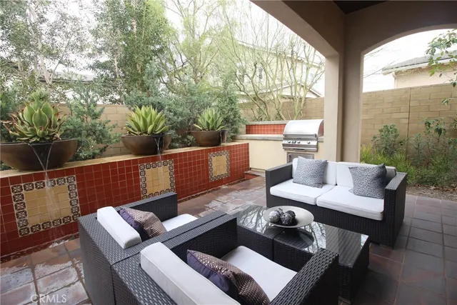 a outdoor living space with furniture and garden view