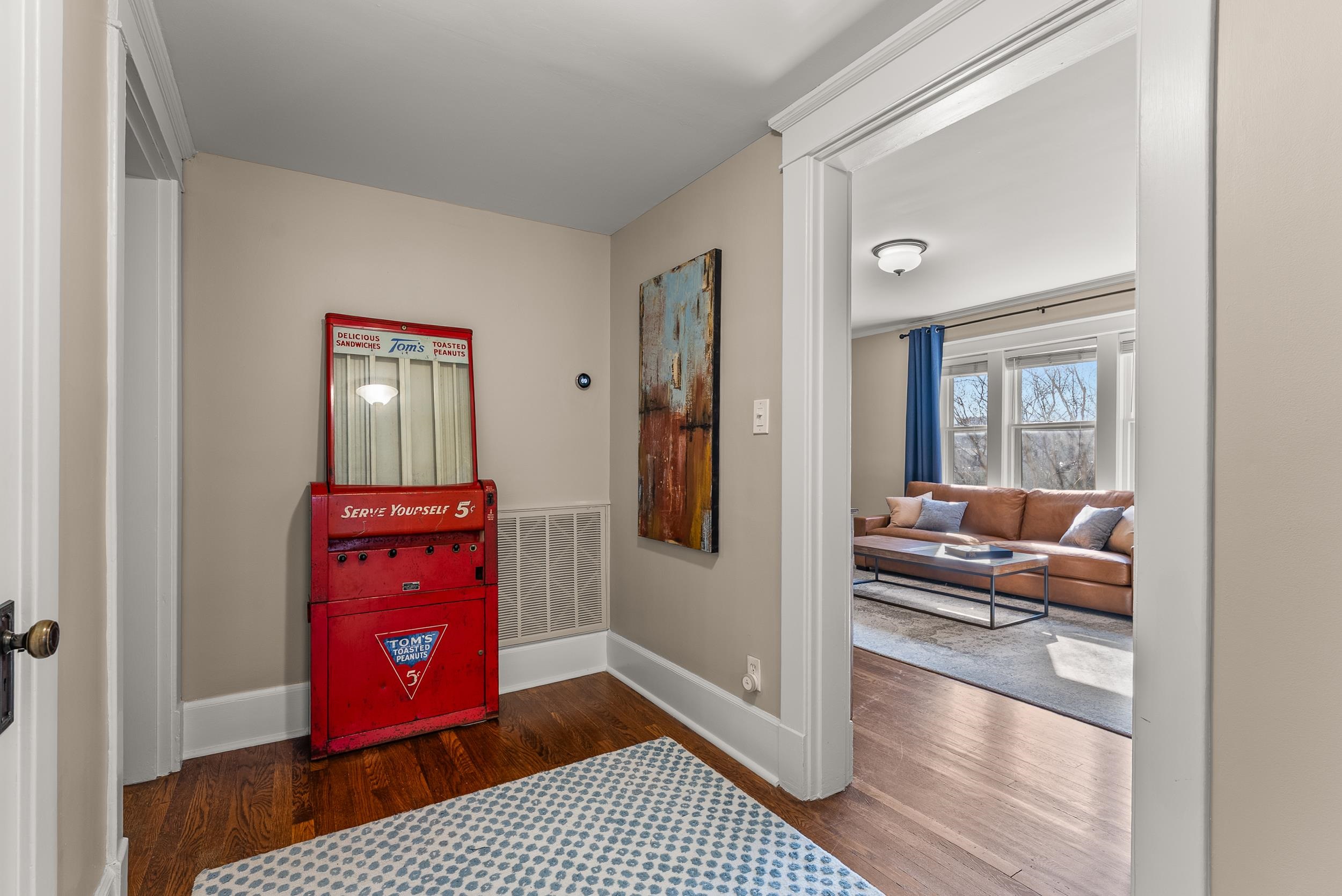 1116 Poplar Avenue, Unit 3 Memphis, TN 38105 - Photo 12 of 25 Corridor featuring dark wood-type flooring and baseboards