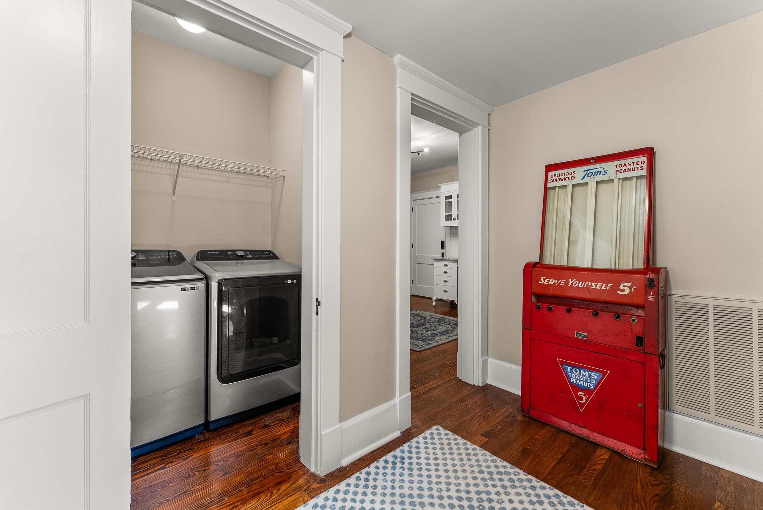 1116 Poplar Avenue, Unit 3 Memphis, TN 38105 - Photo 13 of 25 Washroom featuring dark wood finished floors and separate washer and dryer