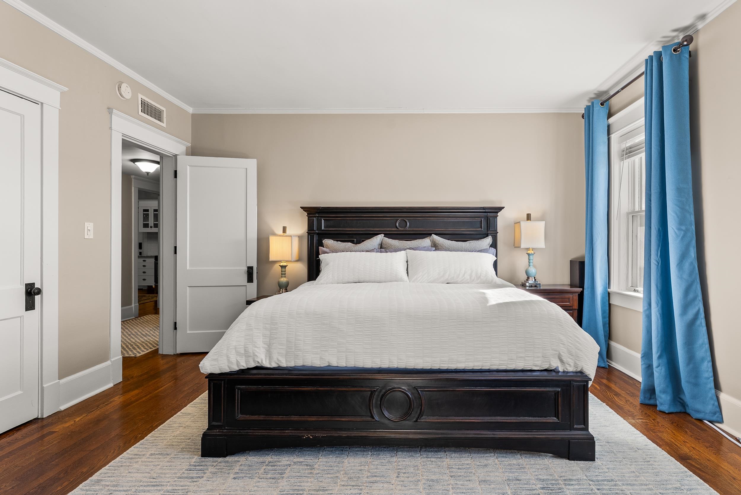 1116 Poplar Avenue, Unit 3 Memphis, TN 38105 - Photo 20 of 25 Bedroom featuring ornamental molding and dark wood-style flooring