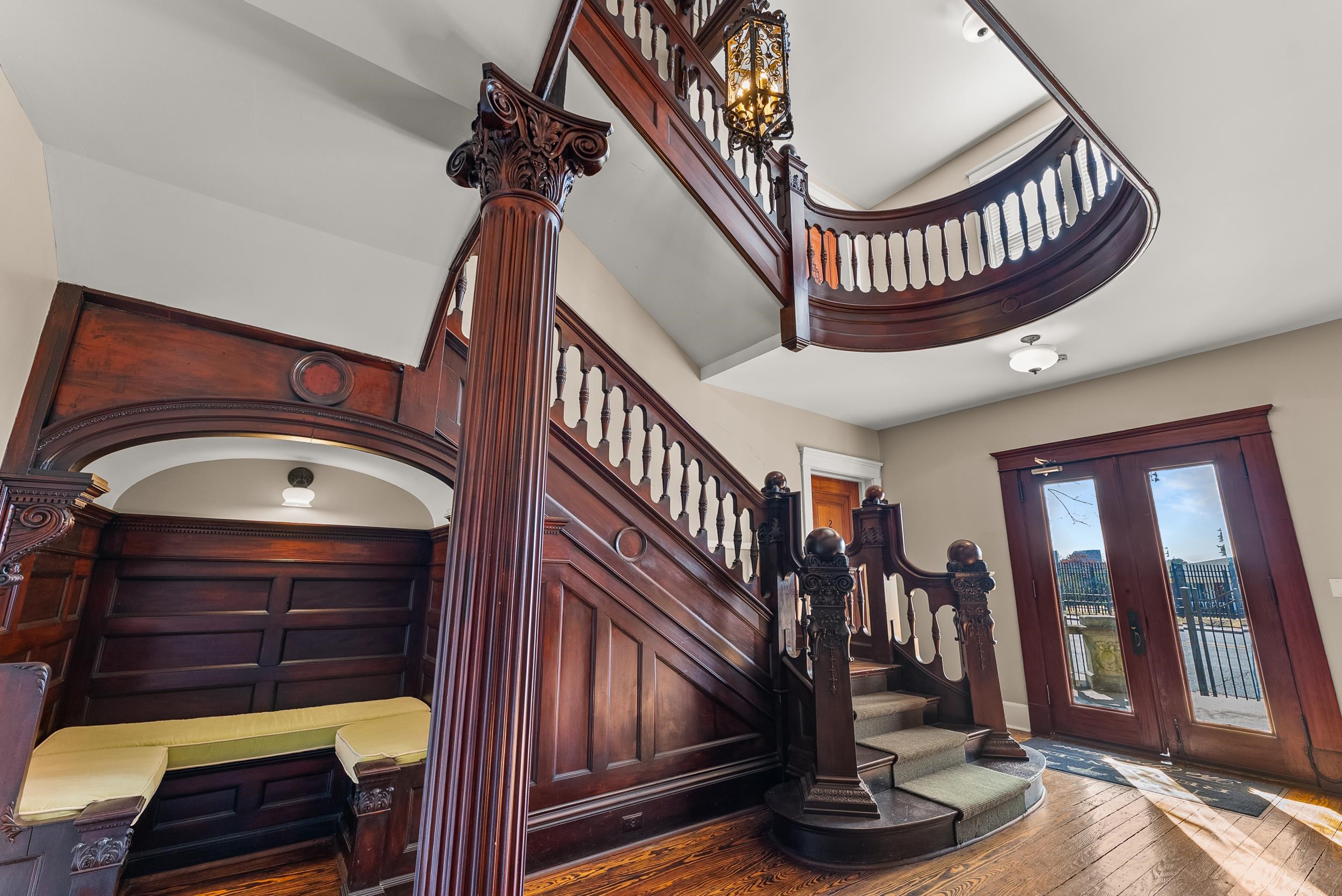 1116 Poplar Avenue, Unit 3 Memphis, TN 38105 - Photo 4 of 25 a view of staircase with white walls and a window