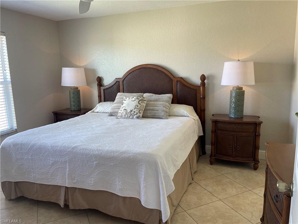 9640 Victoria Lane, Unit C305 Naples, FL 34109 - Photo 9 of 30 King Bed in Master Bedroom