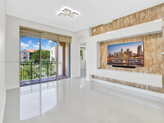 a view of a room with a large window