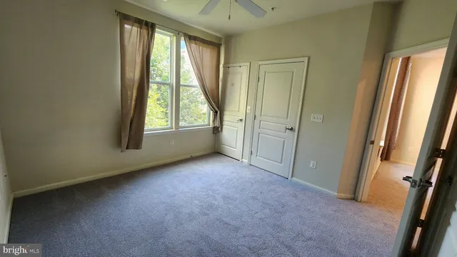 a picture of a wall with a table and a chair