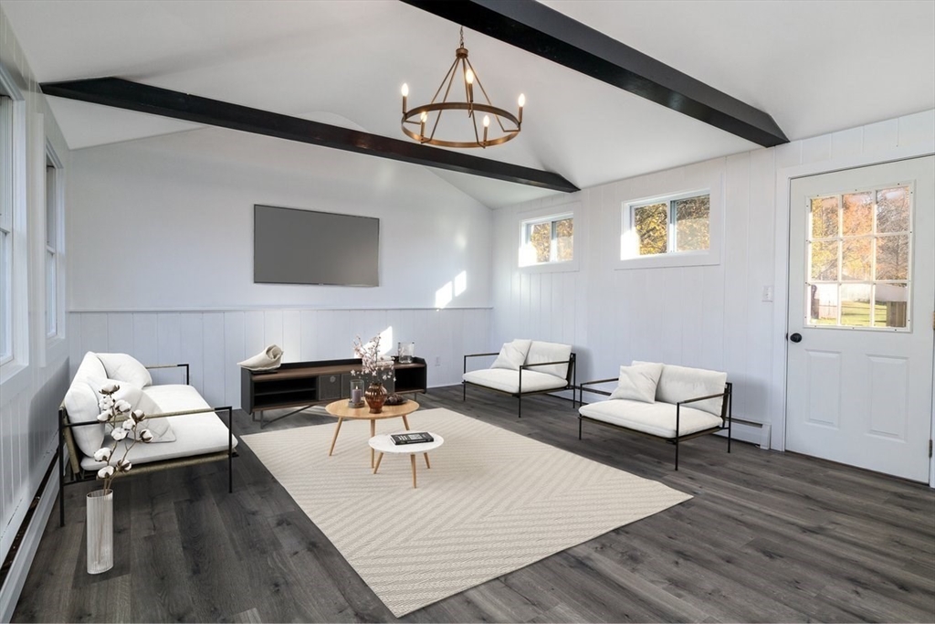 18 Claffey Avenue Worcester, MA 01606 - Photo 20 of 39 a living room with furniture and wooden floor