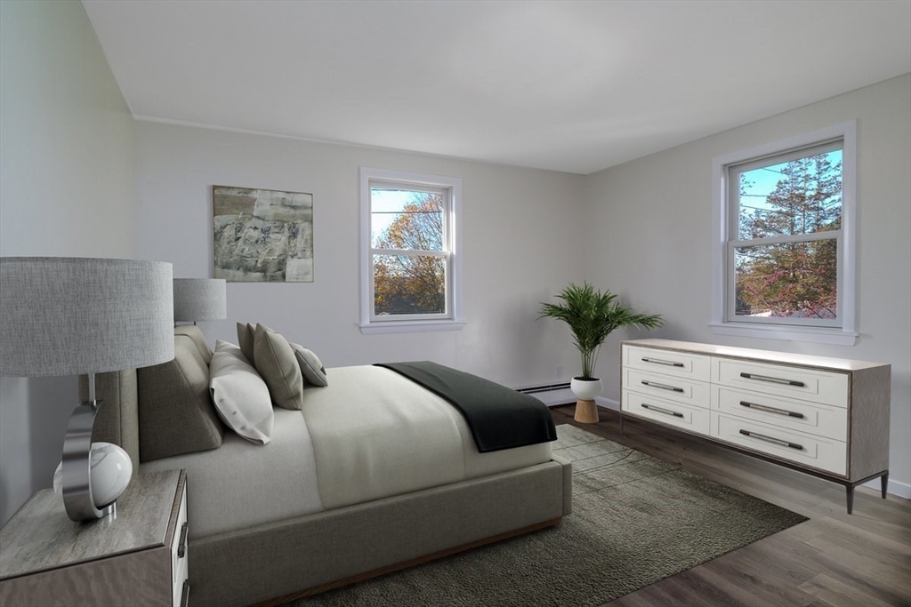 18 Claffey Avenue Worcester, MA 01606 - Photo 27 of 39 a bedroom with a bed and a window