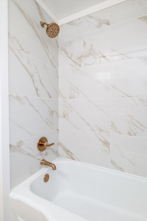 18 Claffey Avenue Worcester, MA 01606 - Photo 33 of 39 a bathroom with a bathtub