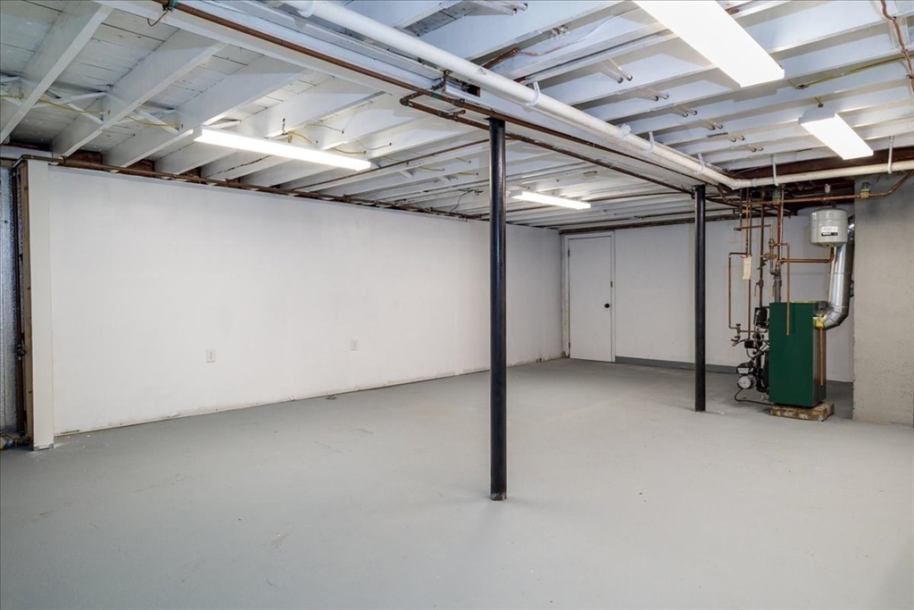 18 Claffey Avenue Worcester, MA 01606 - Photo 34 of 39 a view of a room with gym equipment