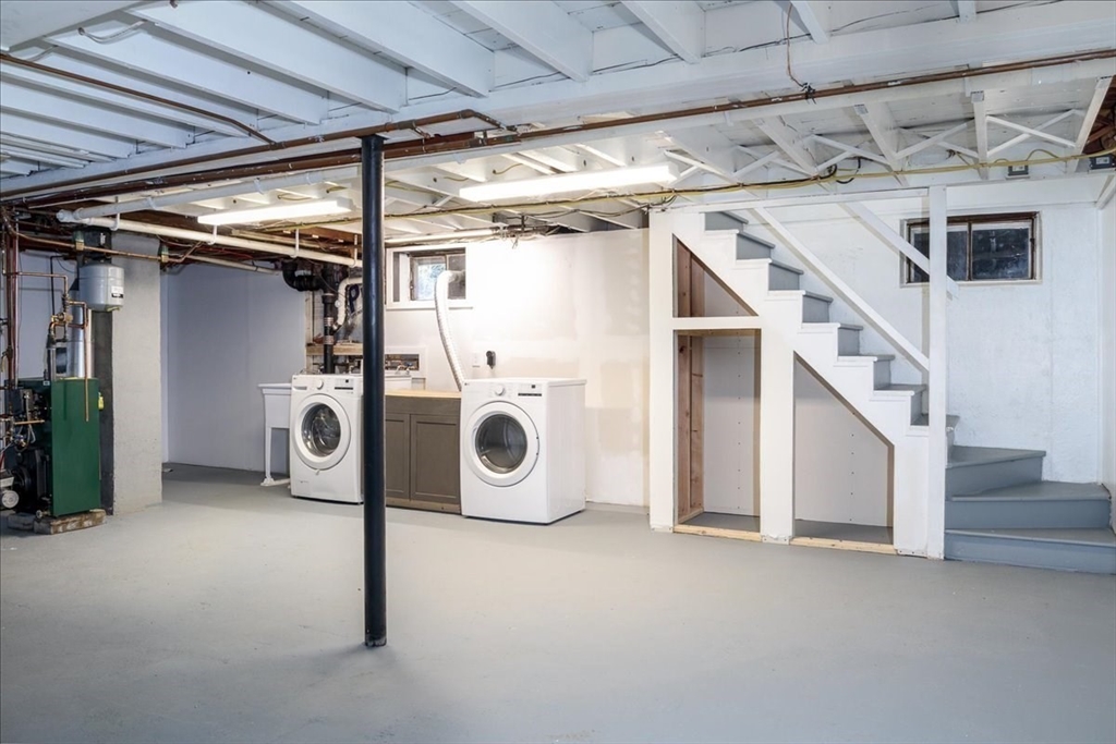 18 Claffey Avenue Worcester, MA 01606 - Photo 35 of 39 a utility room with dryer and washer