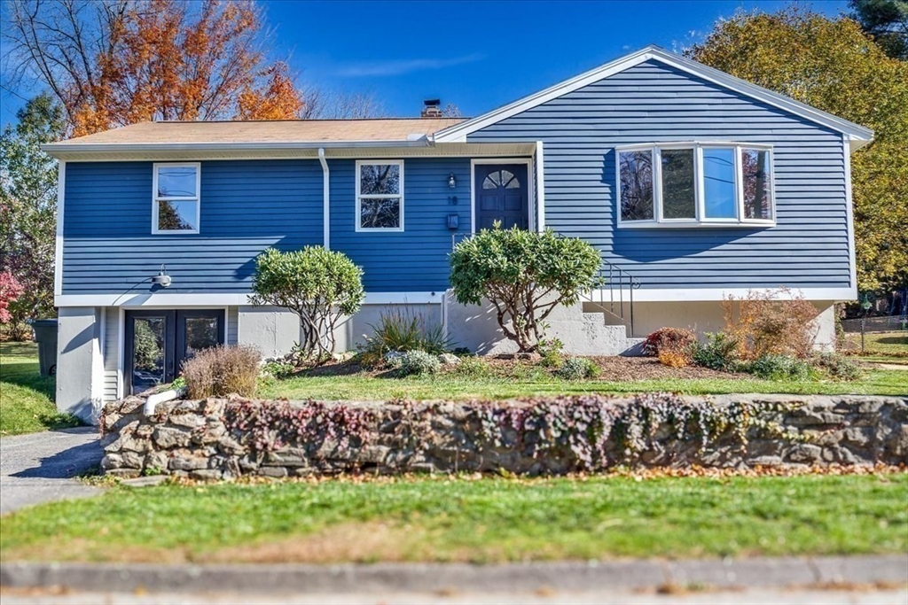 18 Claffey Avenue Worcester, MA 01606 - Photo 38 of 39 a front view of a house with a yard