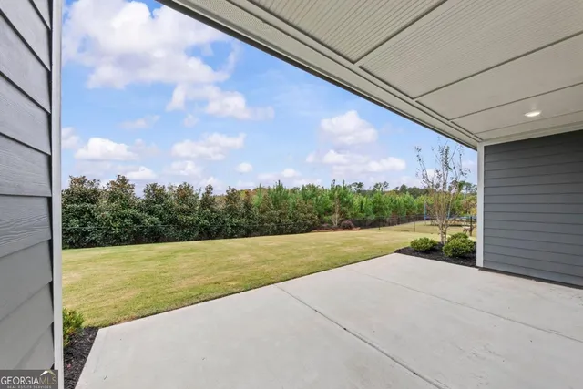an aerial view of residential house with outdoor space