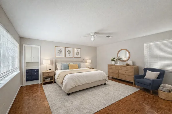 a bed room with a bed and a couch