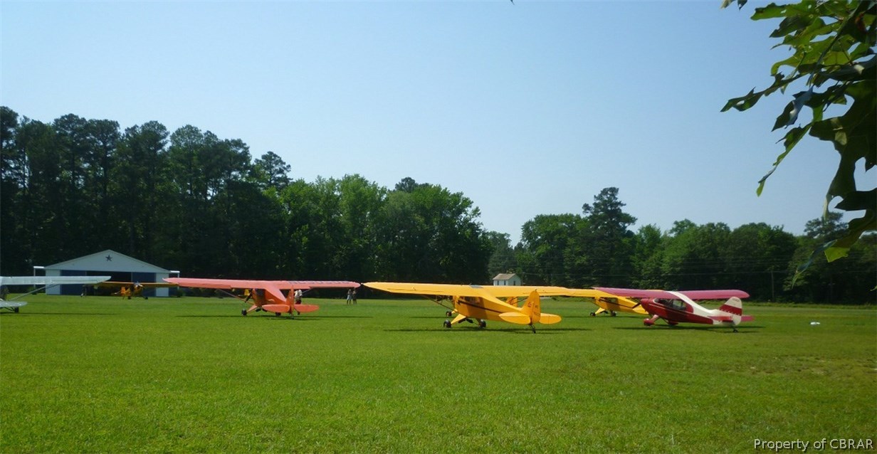 98 Flood Point Road Heathsville, VA 22473 - Photo 9 of 44 Rainbow of planes on the runway during a local event.