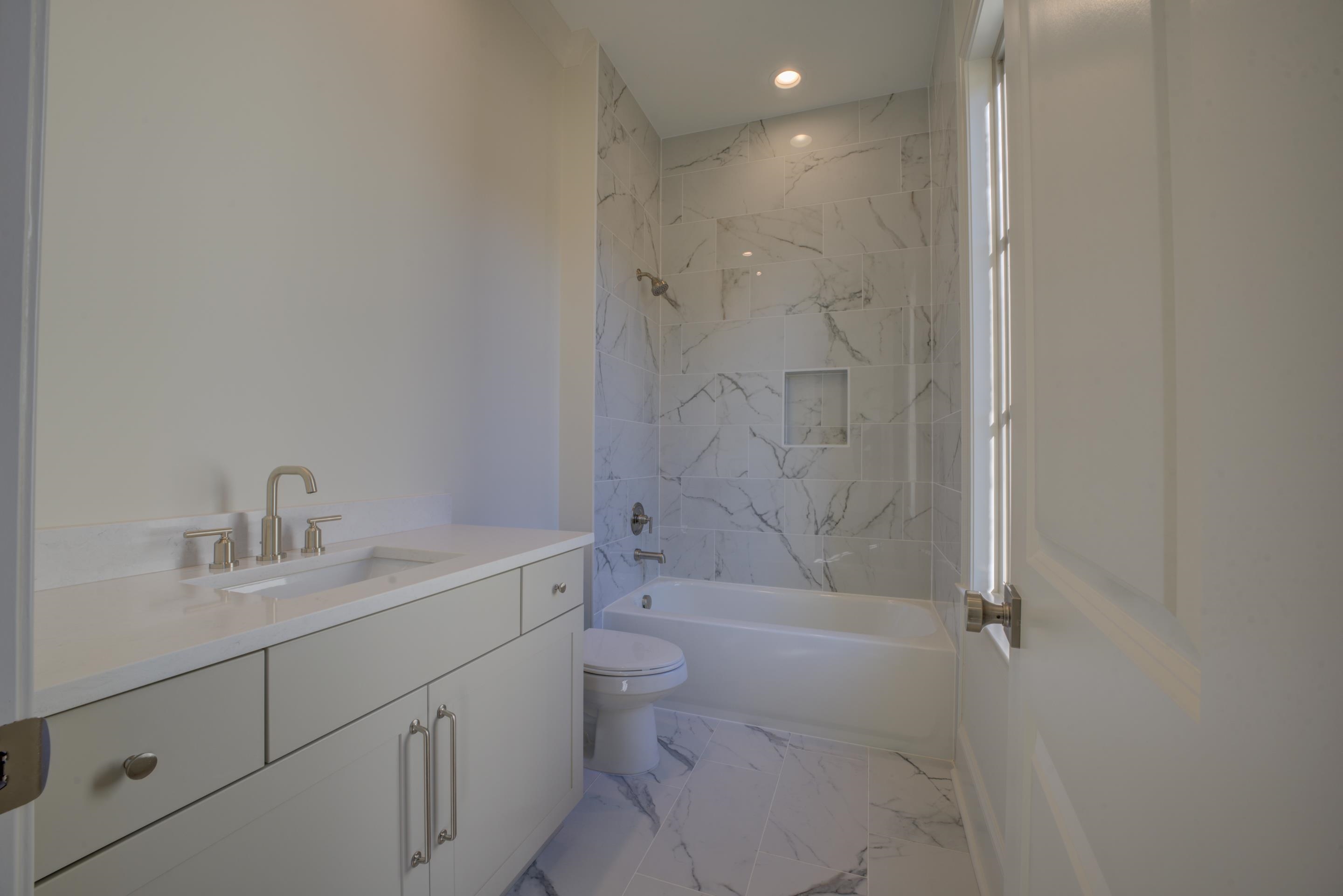 3329 Bailey Station Road Collierville, TN 38017 - Photo 21 of 31 Full bathroom featuring vanity, toilet, and tiled shower / bath