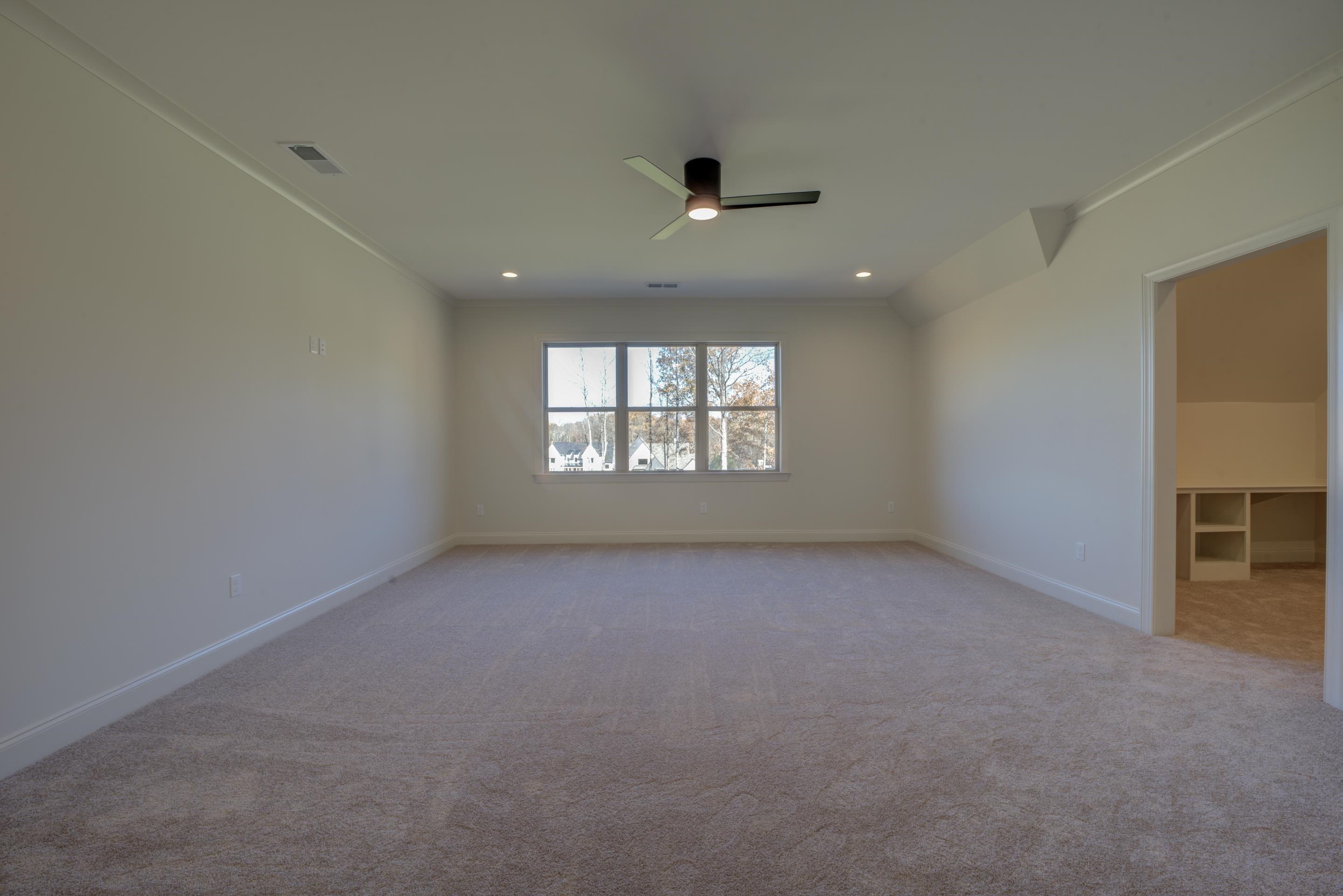 3329 Bailey Station Road Collierville, TN 38017 - Photo 23 of 31 Carpeted empty room with ceiling fan and crown molding