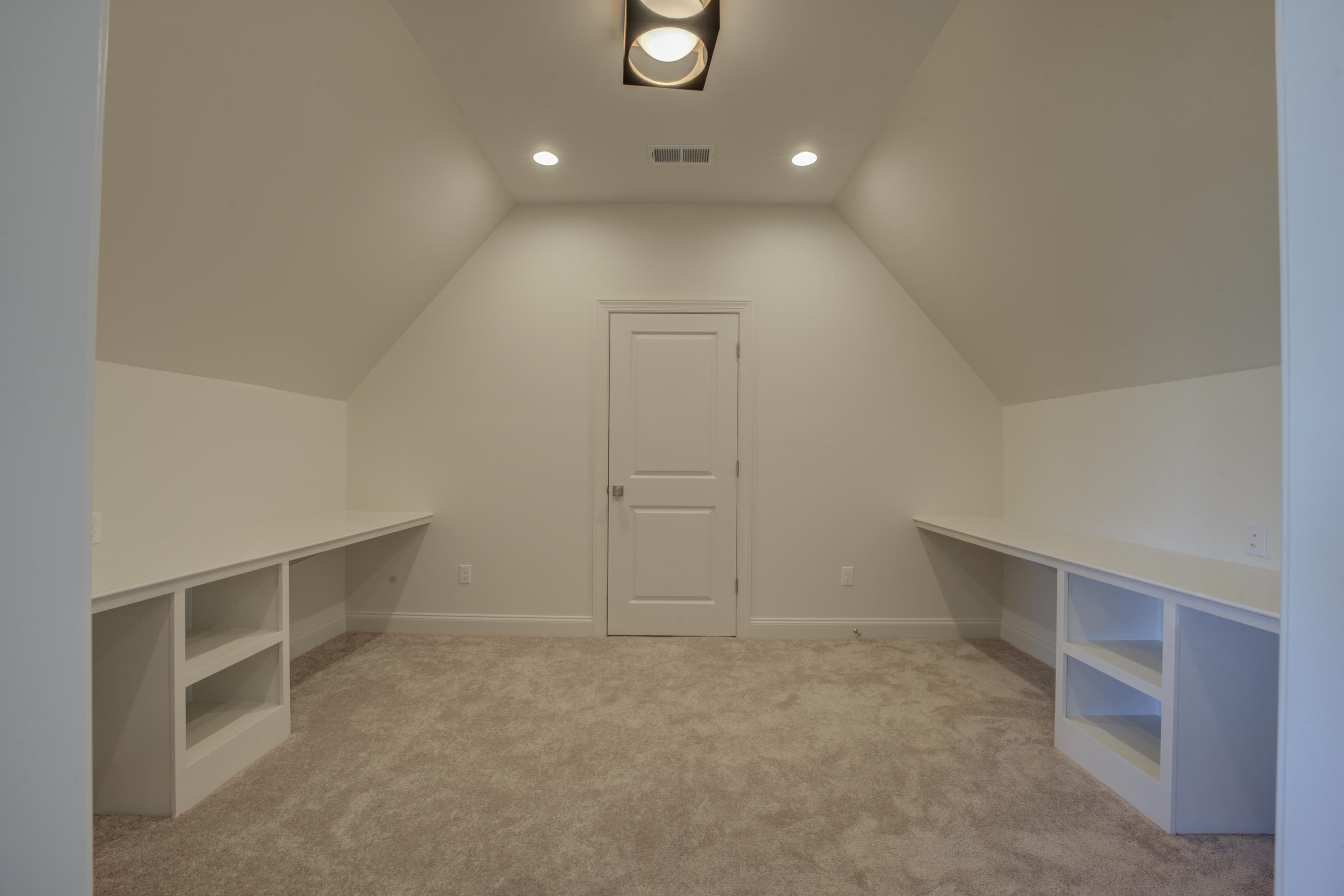 3329 Bailey Station Road Collierville, TN 38017 - Photo 24 of 31 Additional living space featuring light carpet and vaulted ceiling