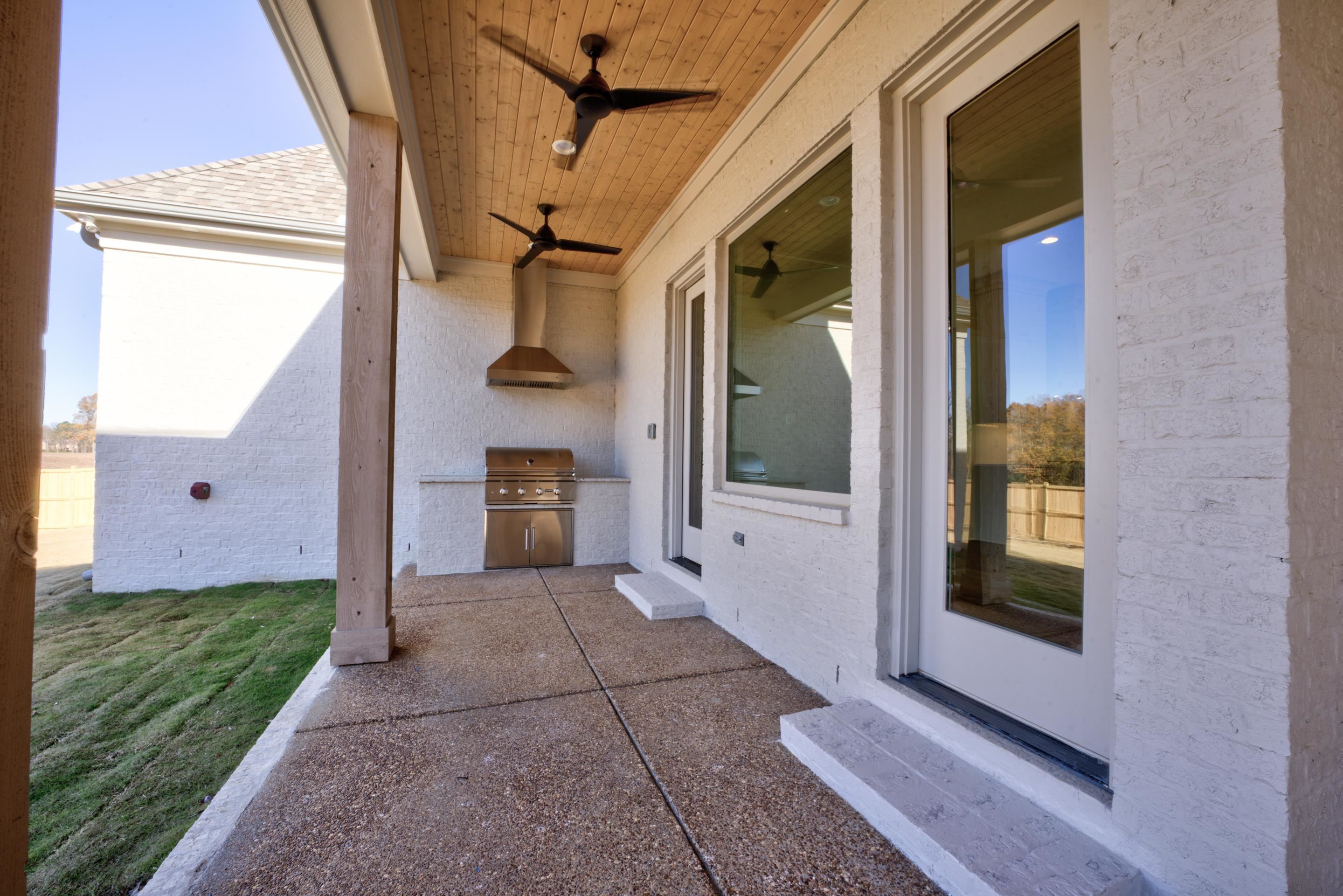 3329 Bailey Station Road Collierville, TN 38017 - Photo 29 of 31 View of patio with ceiling fan, a grill, and an outdoor kitchen