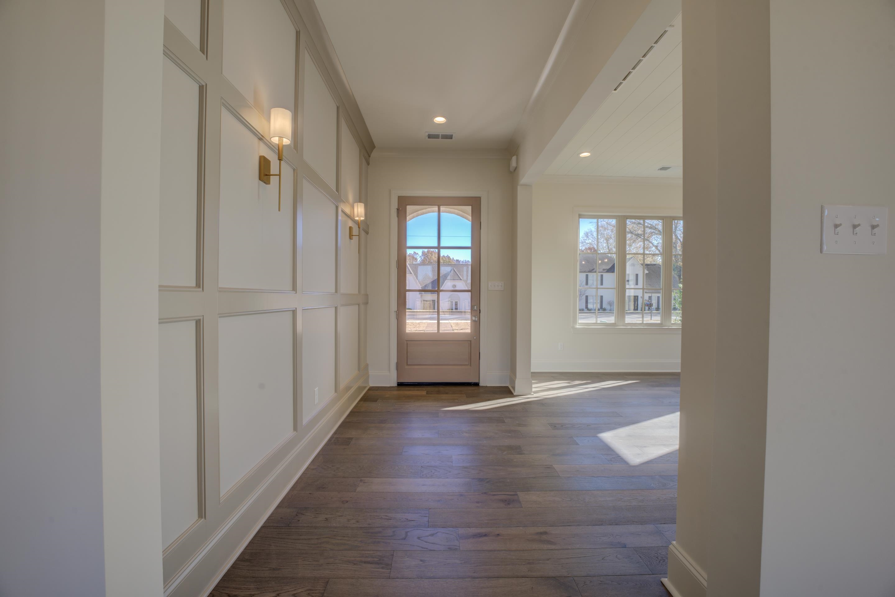 3329 Bailey Station Road Collierville, TN 38017 - Photo 3 of 31 Side entry doorway to outside with dark hardwood.