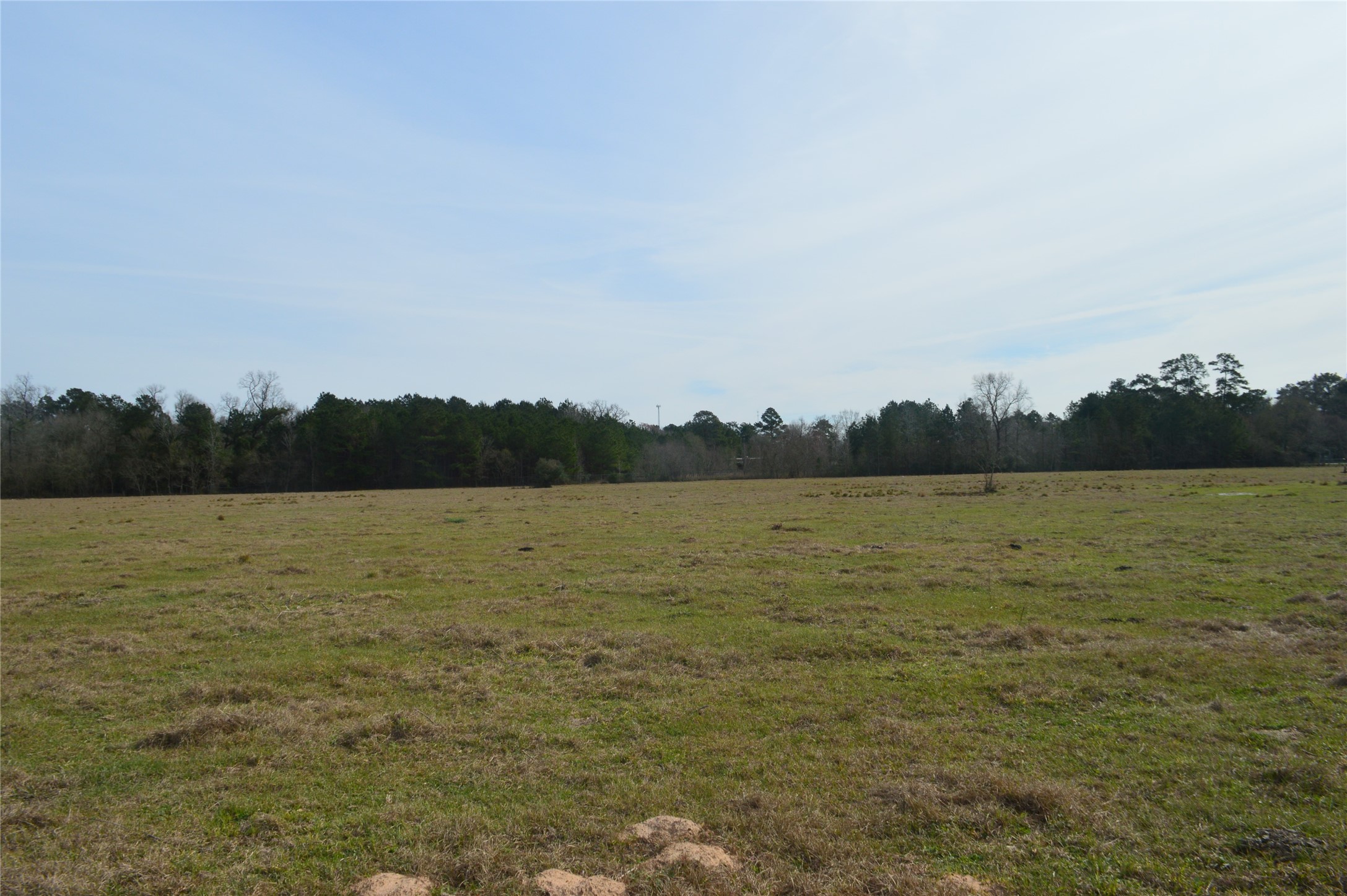 Tbd000 Wiggins Road Conroe, TX 77302 - Photo 3 of 6 a view of lake and mountain