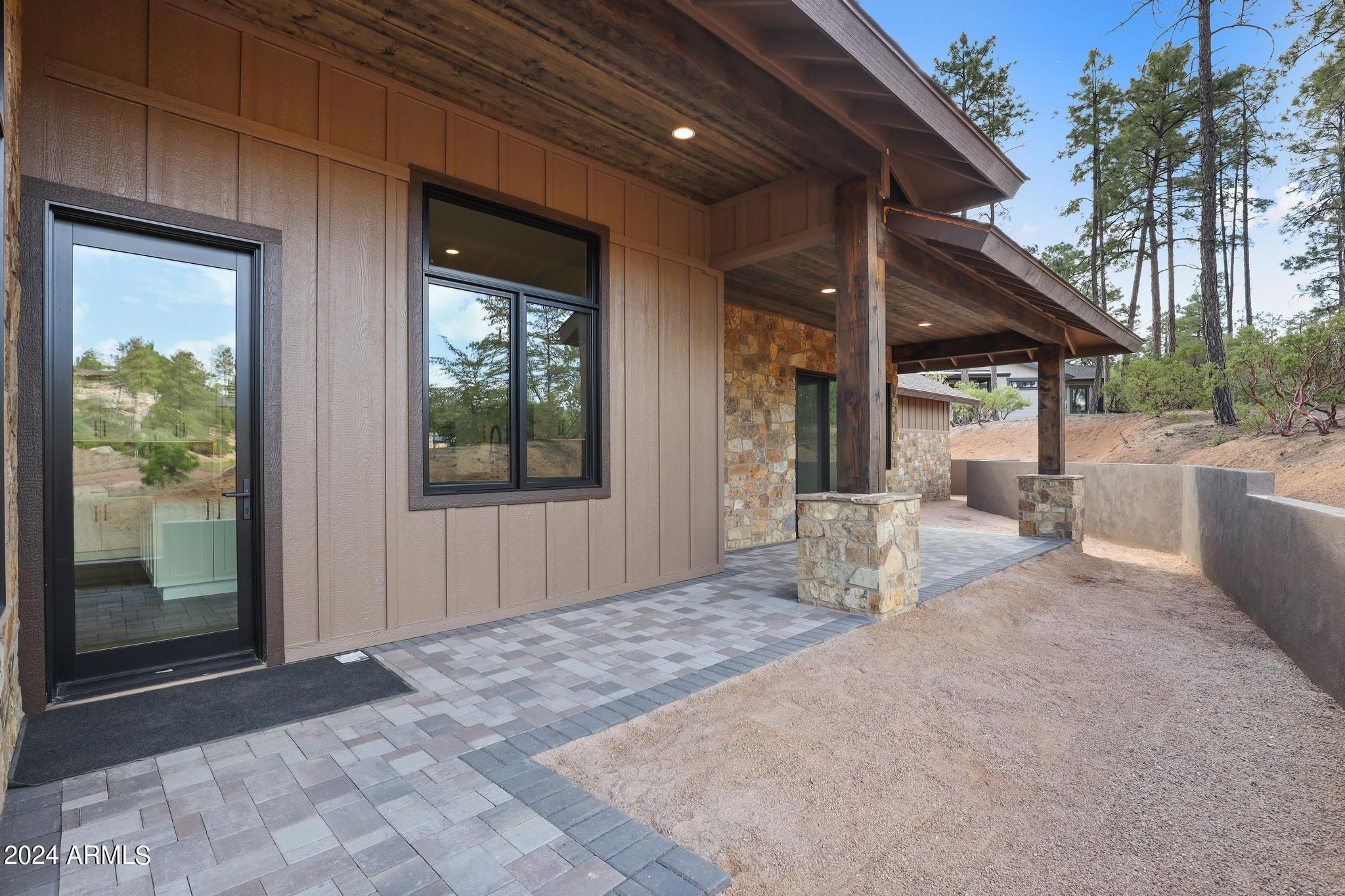 1804 East Senna Point Payson, AZ 85541 - Photo 58 of 67 Pavered Walk Way Around Back of Home