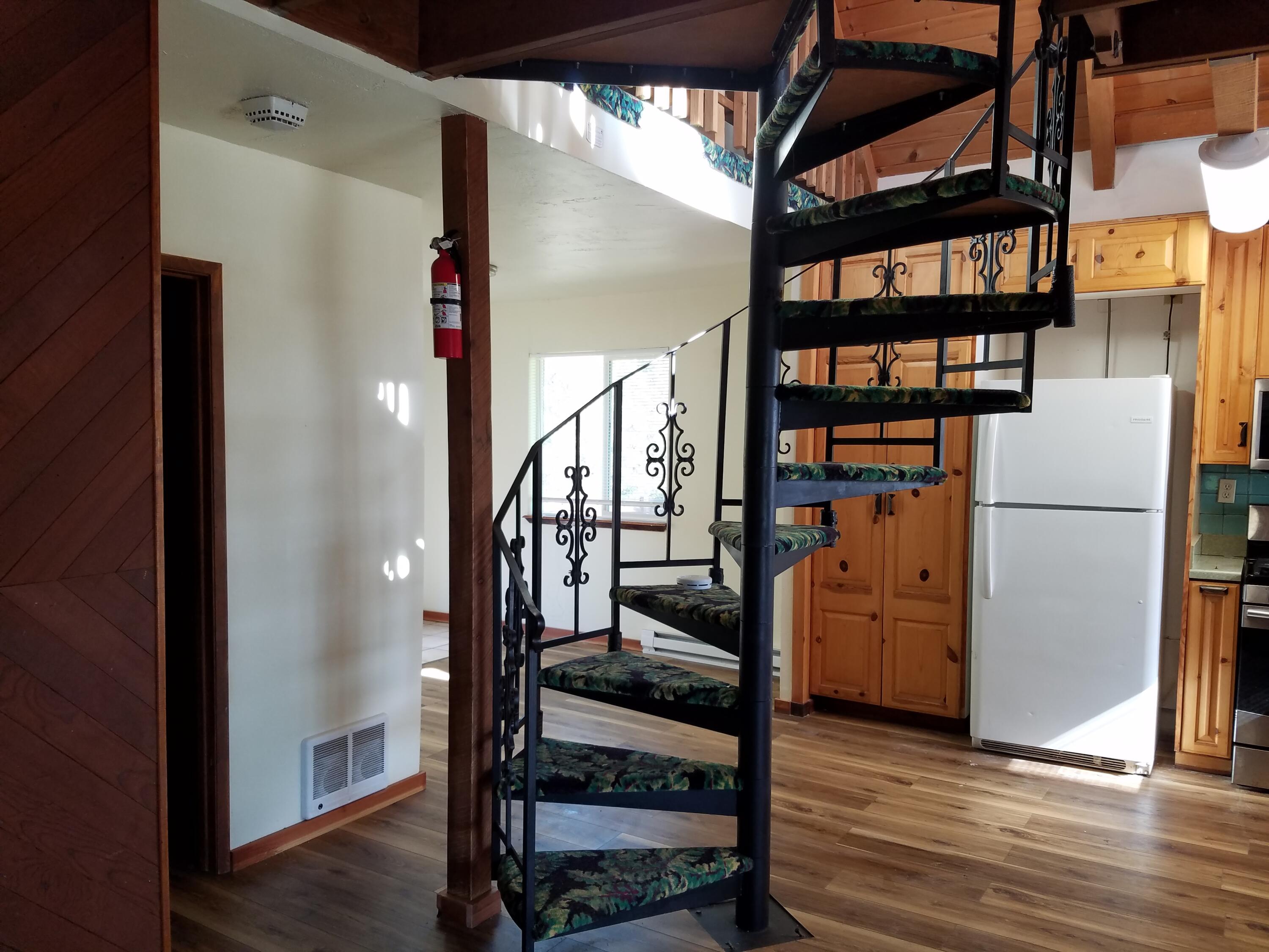 6200 Wilson Hill Road Shingletown, CA 96088 - Photo 31 of 45 a view of entryway and hall with wooden floor
