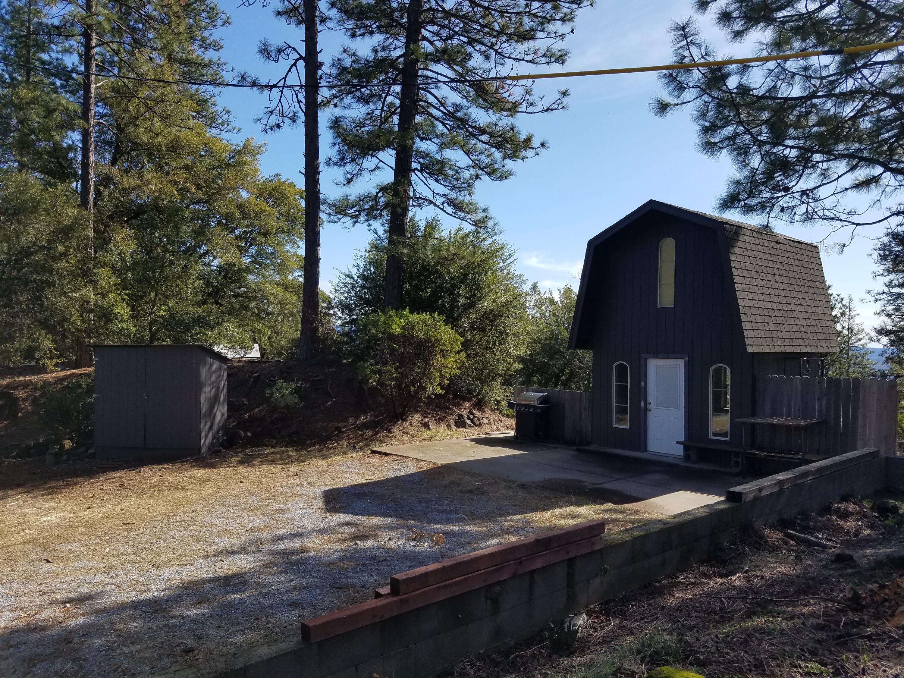 6200 Wilson Hill Road Shingletown, CA 96088 - Photo 41 of 45 a view of a house with a yard