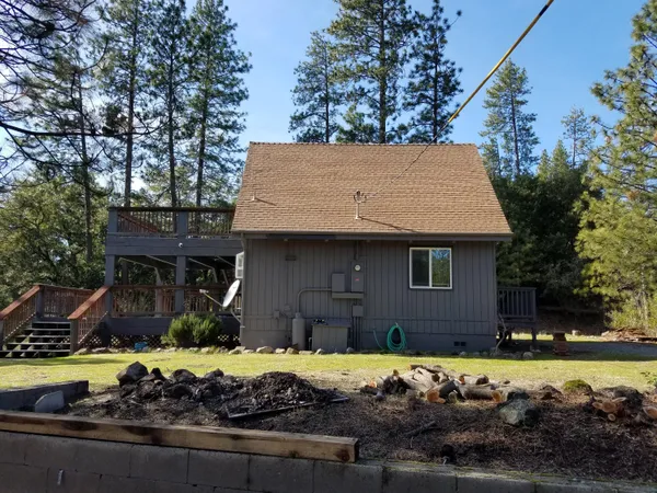 a view of house with outdoor space