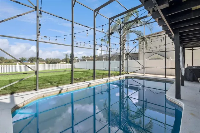 a living room with large windows