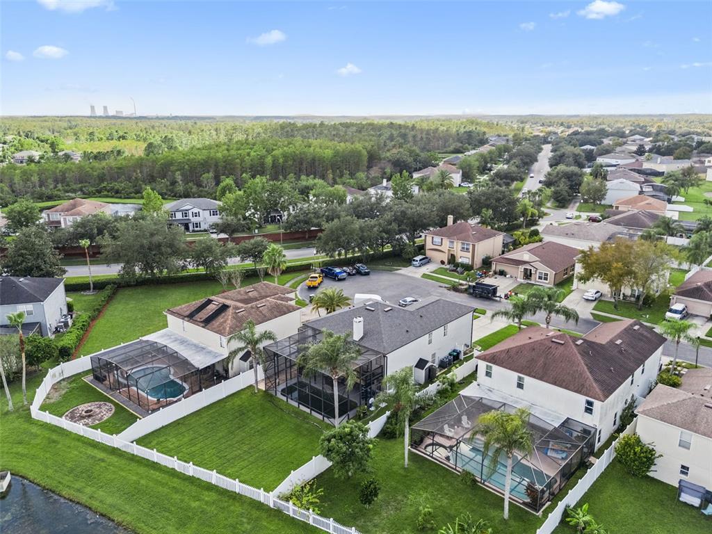 1411 Clarks Summit Court Orlando, FL 32828 - Photo 42 of 50 a view of a lake with garden