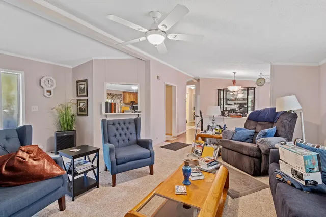 a bedroom with a bed and a view of bedroom