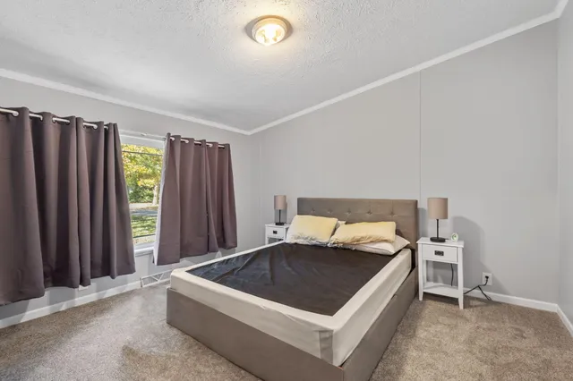 a room with furniture and gym equipment