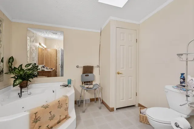 a utility room with sink dryer and washer