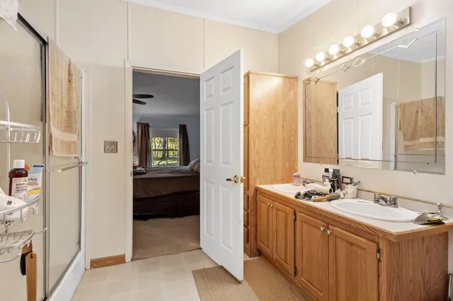 a utility room with sink dryer and washer