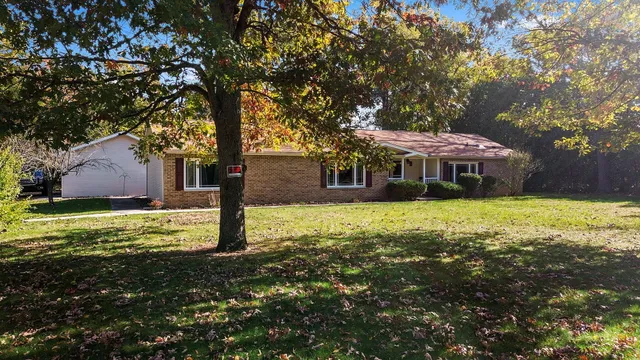 a front view of house with yard
