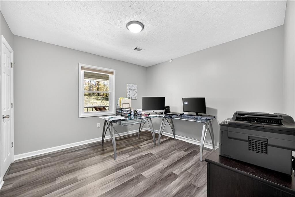 146 Highview Road Southeast Milledgeville, GA 31061 - Photo 18 of 30 a view of a workspace with furniture and a window