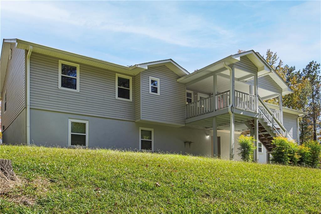 146 Highview Road Southeast Milledgeville, GA 31061 - Photo 23 of 30 a view of a house with a yard and plants