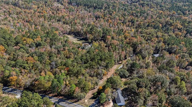 a view of a covered with green field