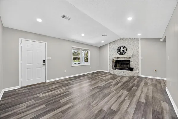 a view of livingroom with washer and dryer