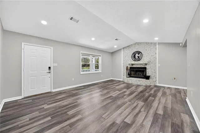 a view of livingroom with washer and dryer