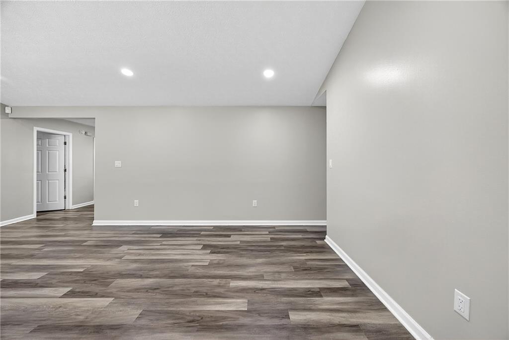 146 Highview Road Southeast Milledgeville, GA 31061 - Photo 6 of 30 a view of room with wooden floor