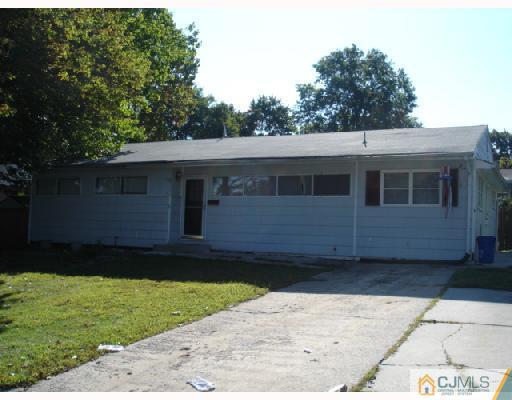 87 Princeton Road Old Bridge, NJ 08859 - Photo 1 of 2 a house view with a garden space