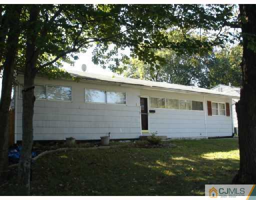 87 Princeton Road Old Bridge, NJ 08859 - Photo 2 of 2 a front view of a house with yard