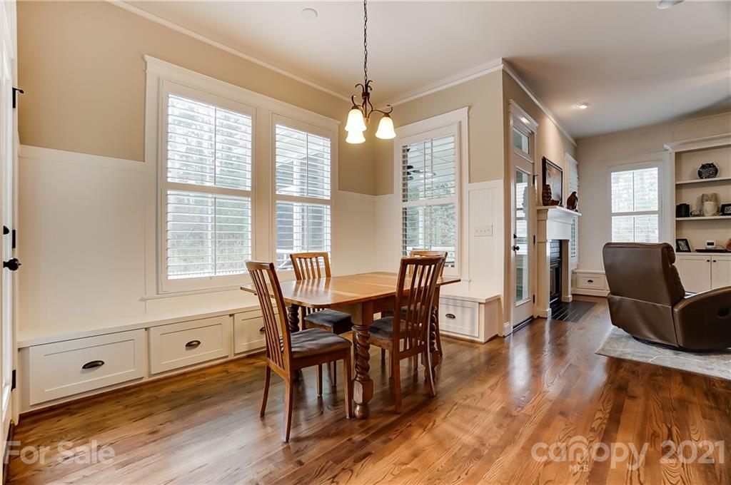 829 Elswick Court Fort Mill, SC 29708 - Photo 17 of 48 a view of a dining room with furniture window and wooden floor