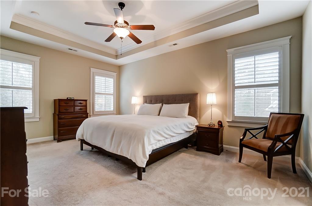 829 Elswick Court Fort Mill, SC 29708 - Photo 28 of 48 a spacious bedroom with a bed and window