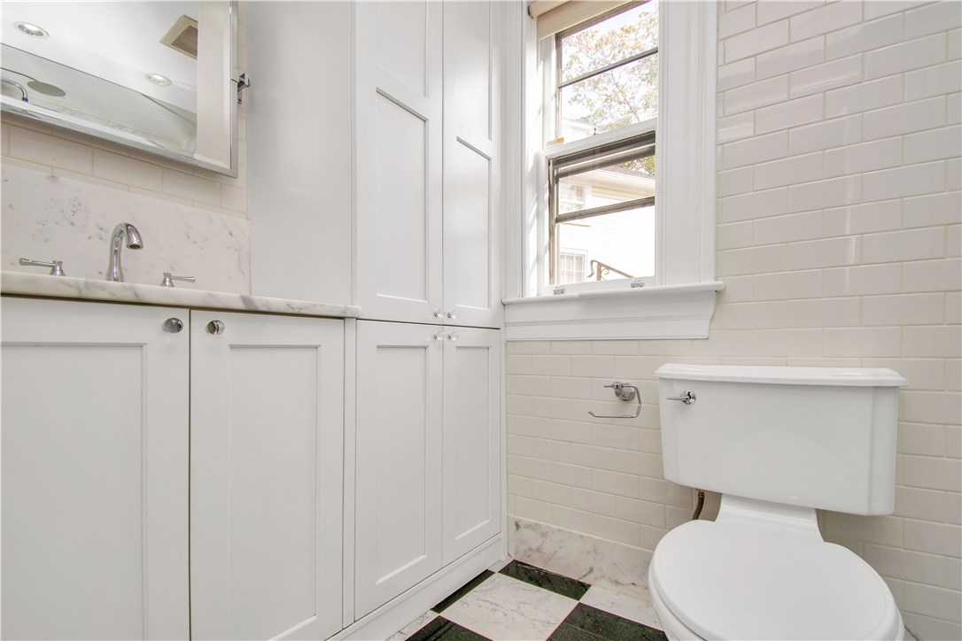 367 Benefit Street, Unit 3 Providence, RI 02903 - Photo 19 of 26 Master en-suite 3/4 bath accessed by glass pocket door: featuring marble-top vanity, classic black/white marble floor