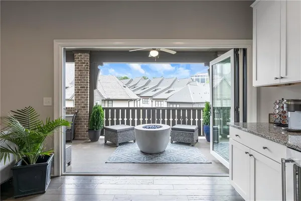 a view of a living room and a potted plant